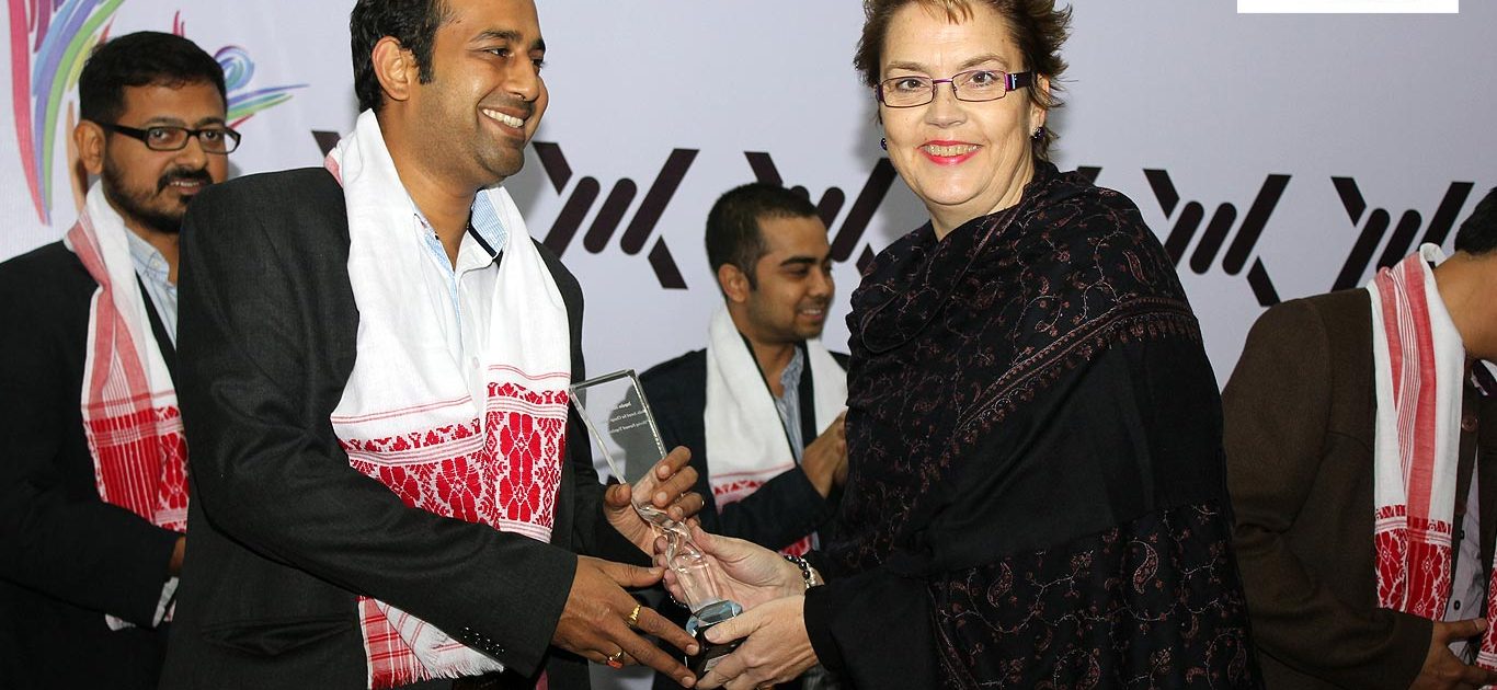 Impulse ModeAmit Patro, Editor of Sikkim Express receives the Impulse Model Media Award, for Change Makers 2013, from Ms. Cristina Albertin, Representative of the UNODC Regional Office for South Asial | The role of the Press against Human Trafficking